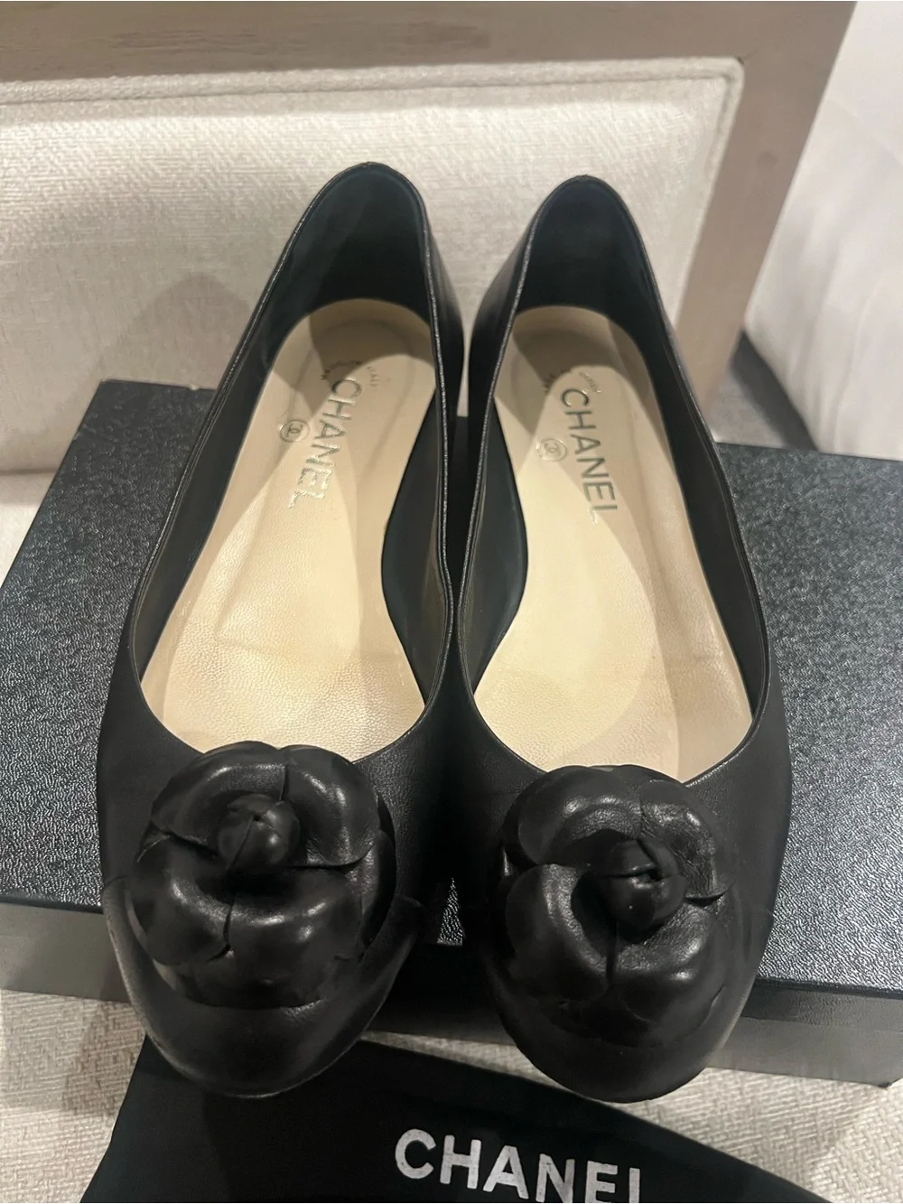 CHANEL Black Leather Camellia Round-Toe Flats